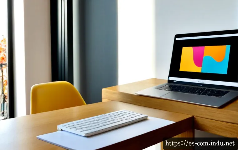 최고의 외장 모니터 추천 - Photorealistic modern home office in Madrid, a sleek portable external monitor beside an open laptop...